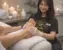 Professional foot massage during pedicure service at 5T Beauty Academy in Raleigh NC