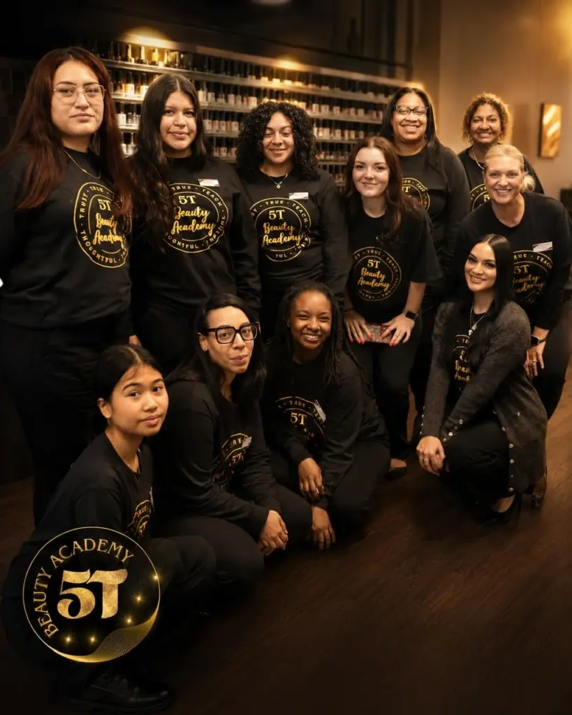 Beauty school students learning salon management and beauty business skills at 5T Beauty Academy.